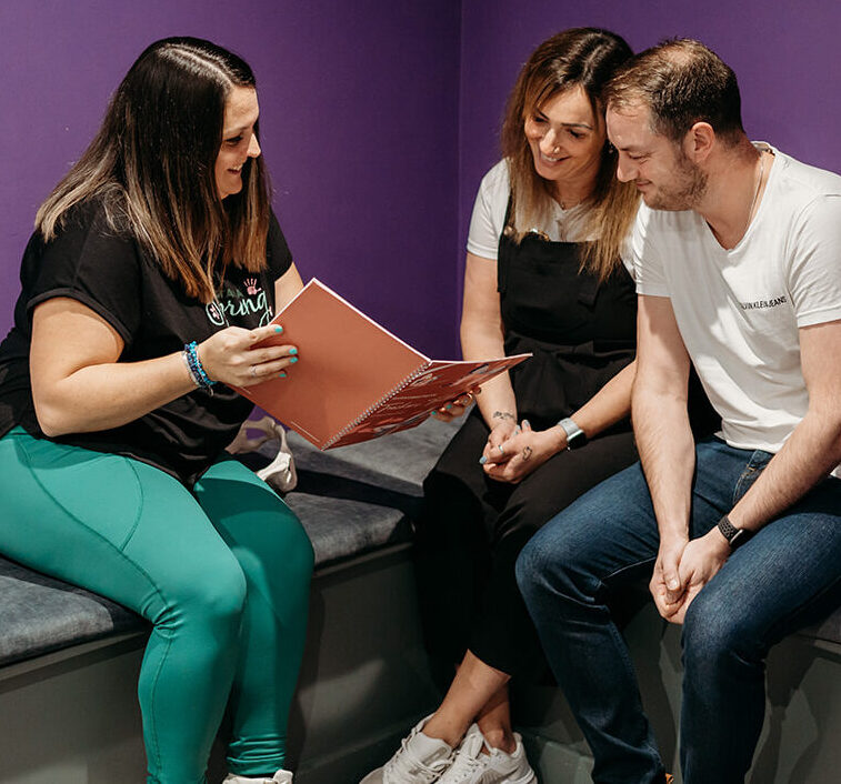 Danielle working with a pregnant couple