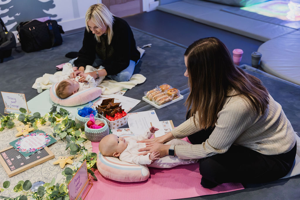mums massaging their babies