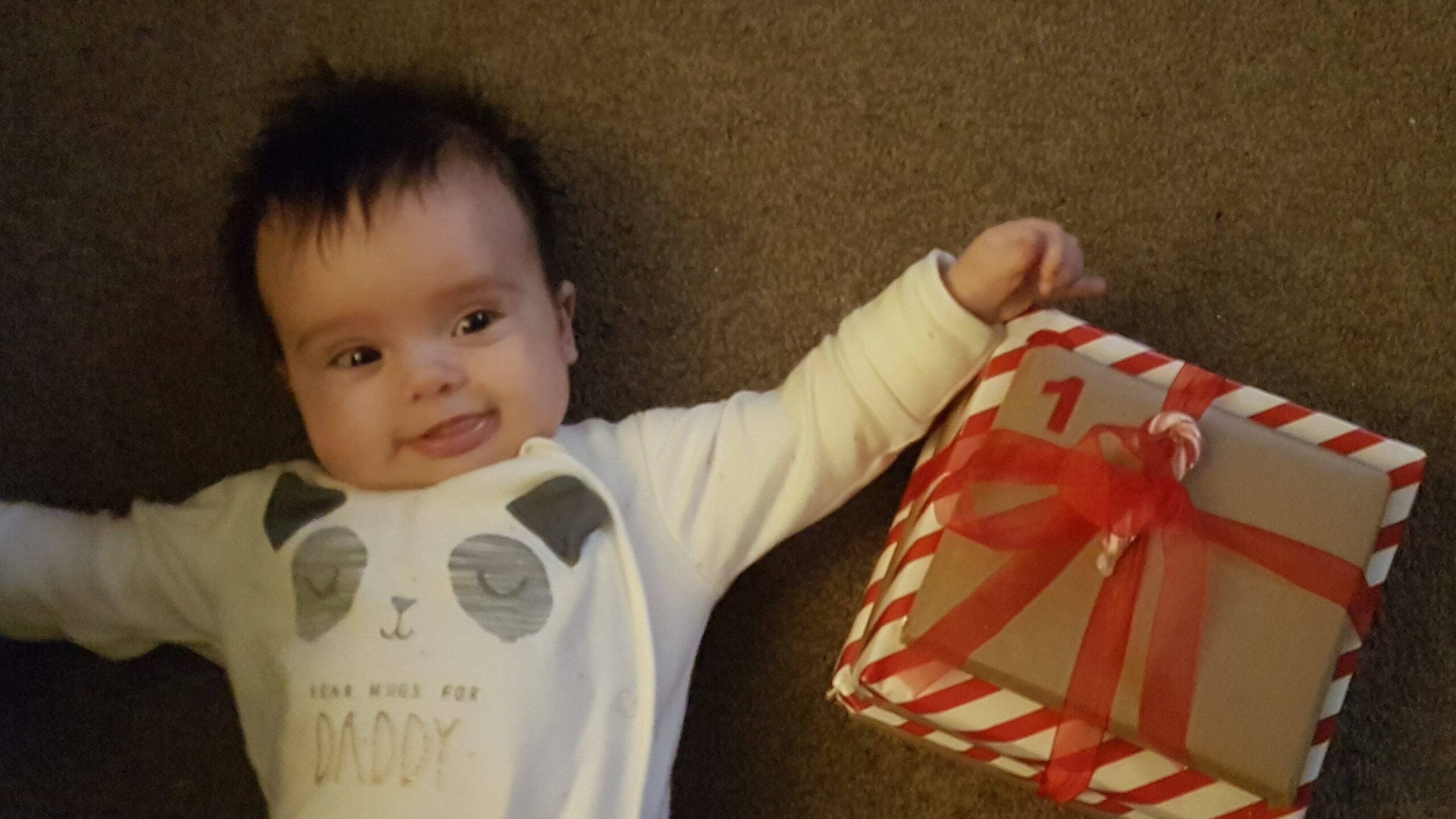 Baby with an advent calender

