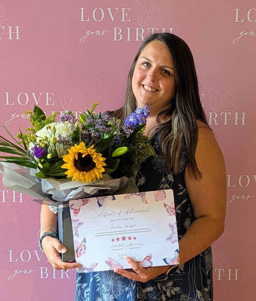 Danielle Springall receiving the Love Your Birth Recognised for Excellence award for outstanding performance and dedication.