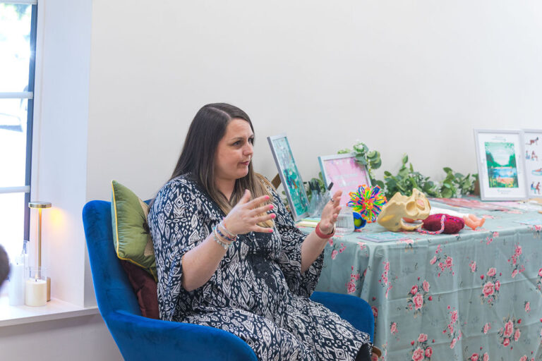 Hypnobirthing educator explaining pain relief options during a calm antenatal class in Grimsby.